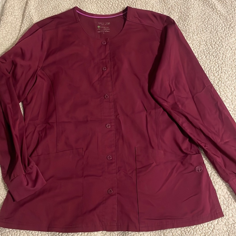 In great condition. Healing Hands Purple label size Large scrub jacket